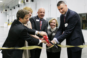 Feeding America Eastern Wisconsin officially opened the new food bank in Little Chute on Oct. 30, 2015 with a VIP event and ribbon cutting. From left to right: Ted Balistreri, chairman of the board; Patti Habeck, executive vice president; Charles McLimans, president/CEO; Diana Walker, and William Bohn, chairman-elect.